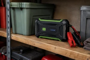 Jump starter sitting unused on a garage shelf